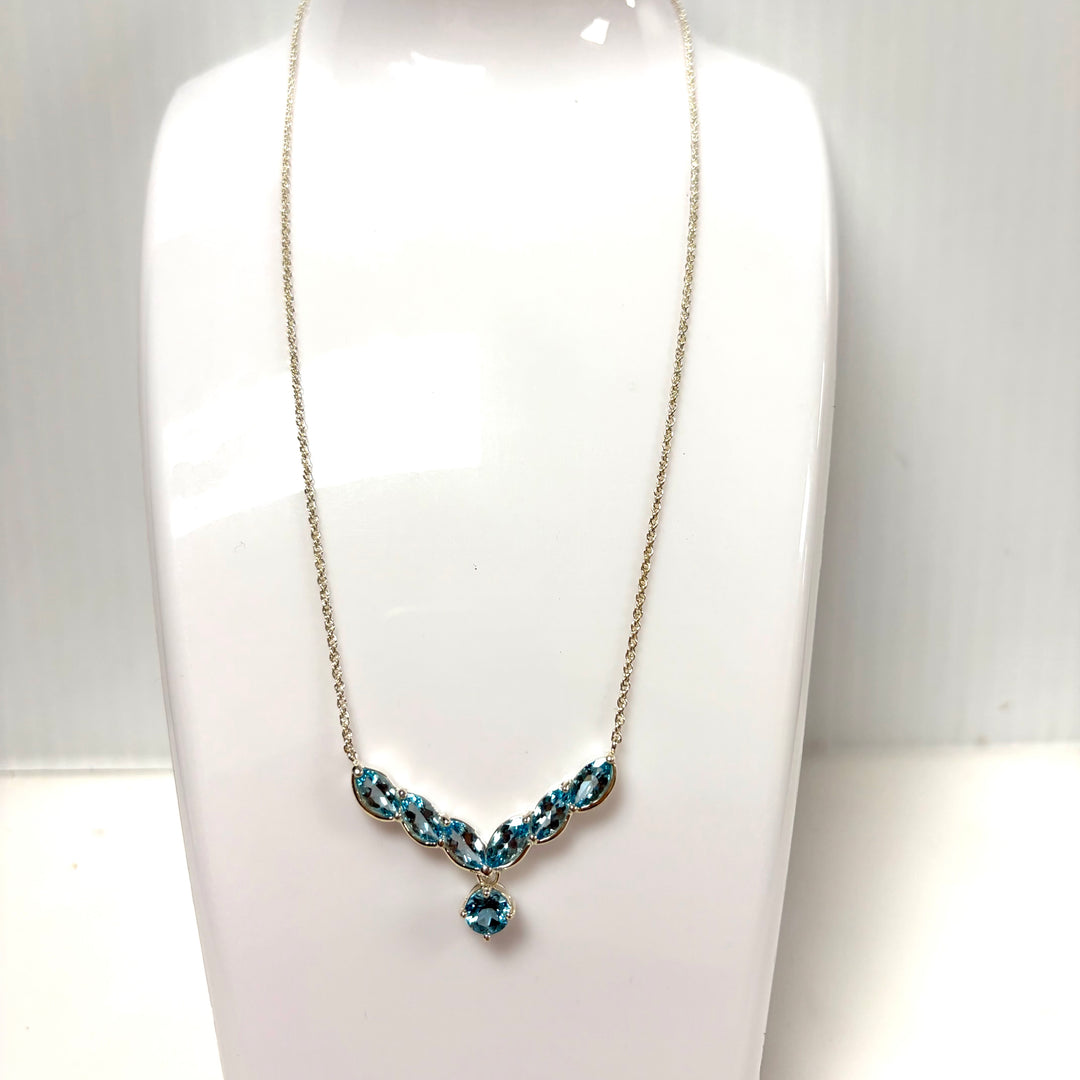 w139 Vintage V-shaped Pendant Necklace Featuring Blue Topaz in Sterling Silver
