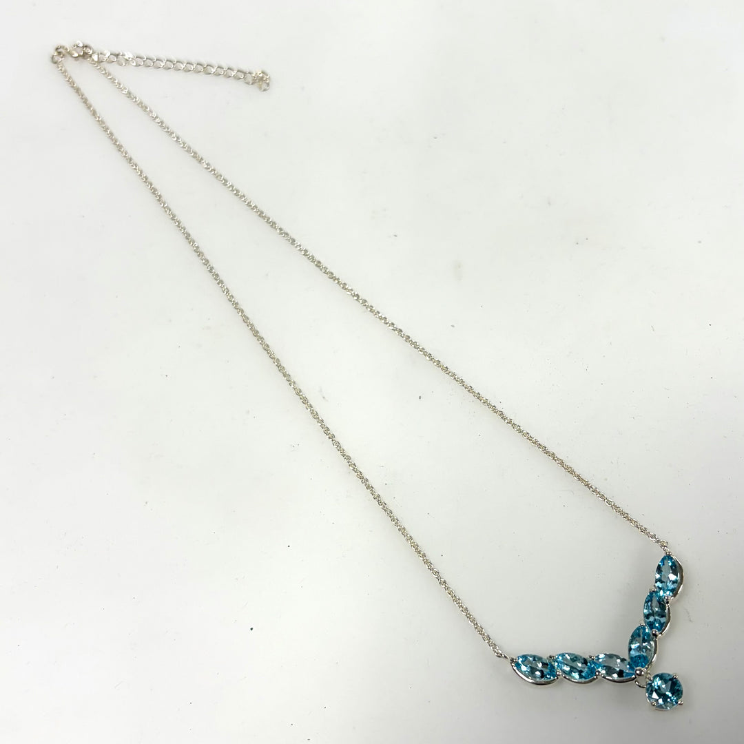 w139 Vintage V-shaped Pendant Necklace Featuring Blue Topaz in Sterling Silver