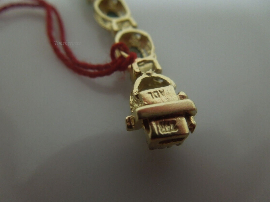 r878 Beautiful 14kt Yellow Gold Emerald Diamond .17 cts Tennis Bracelet Signed 6.5"