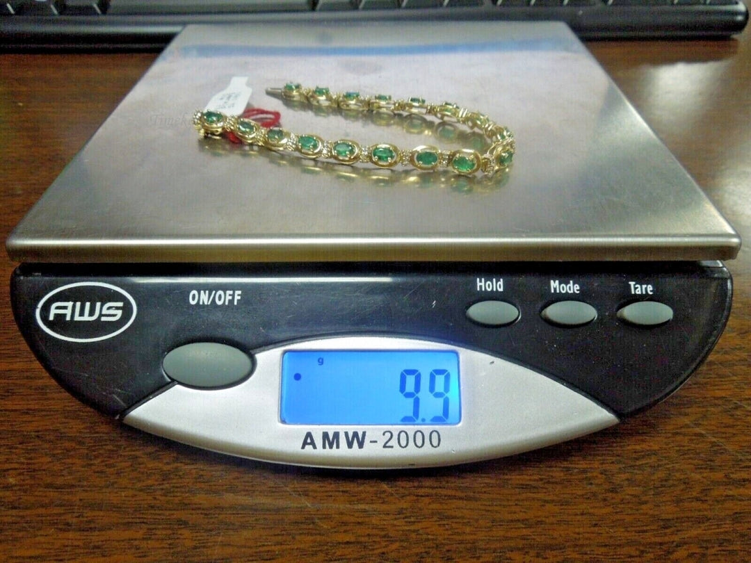 r878 Beautiful 14kt Yellow Gold Emerald Diamond .17 cts Tennis Bracelet Signed 6.5"