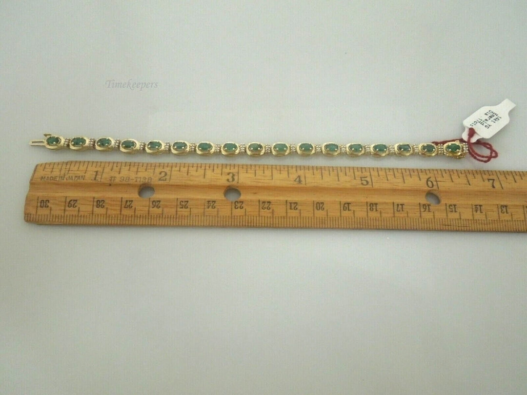 r878 Beautiful 14kt Yellow Gold Emerald Diamond .17 cts Tennis Bracelet Signed 6.5"