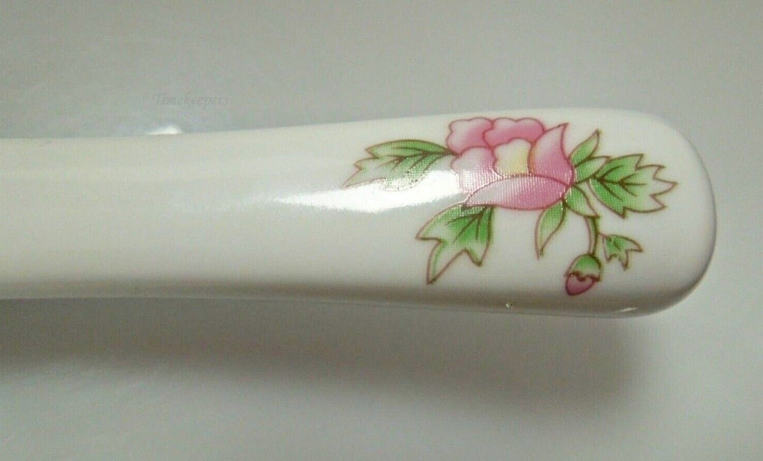r972 Cake/pie server slicer Ceramic Floral pattern Vintage good condition Spatula 