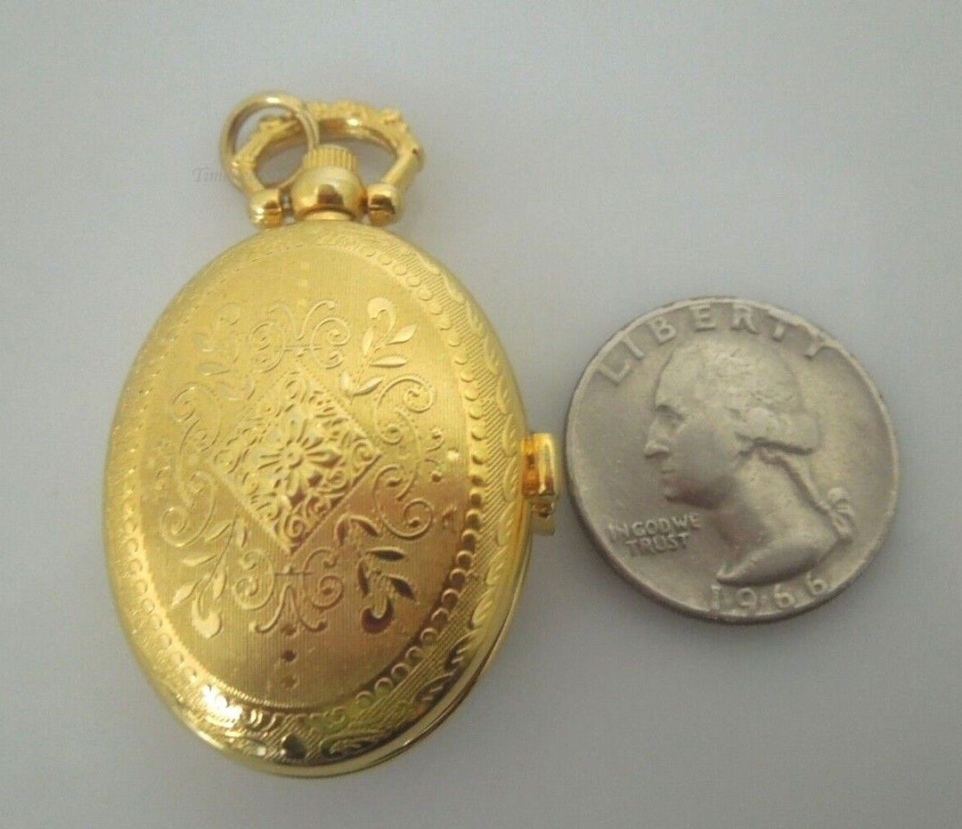 r867 Vintage Oval Etched Quartz Pocket Watch Clock Gold tone Pendant Rare