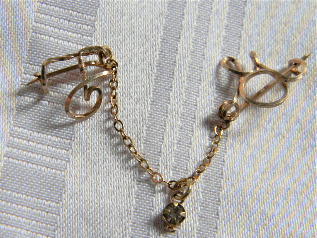 h644 Beautiful Vintage Gold Filled Double Pin Sweater Guard with White Stone