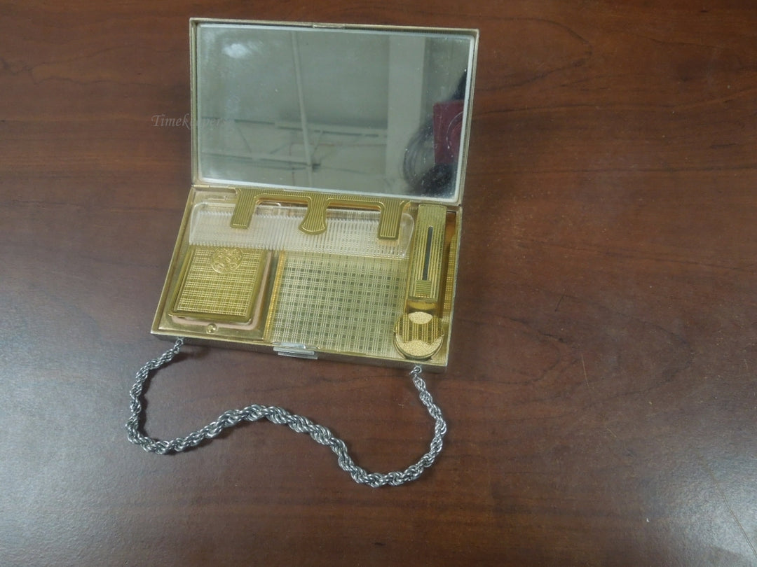 r785 Vintage 1940’s EVANS Rhinestone Encrusted Flower Silvertone Wristlet Compact Case