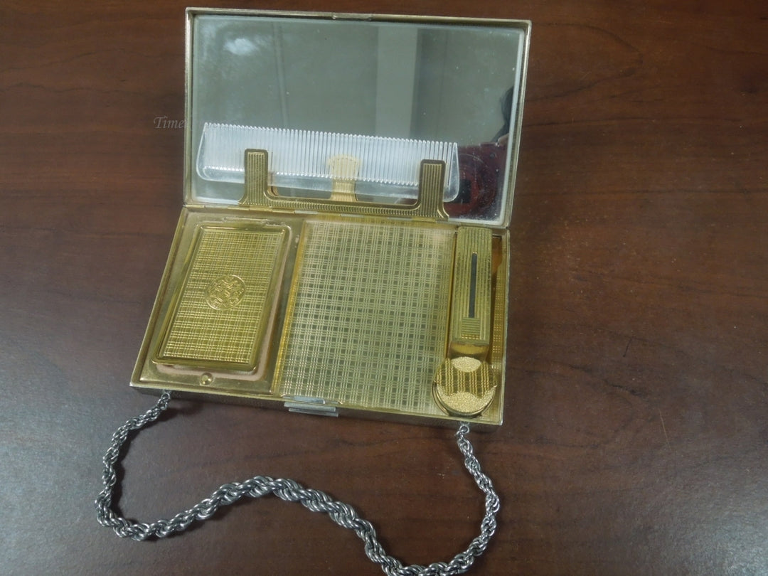 r785 Vintage 1940’s EVANS Rhinestone Encrusted Flower Silvertone Wristlet Compact Case