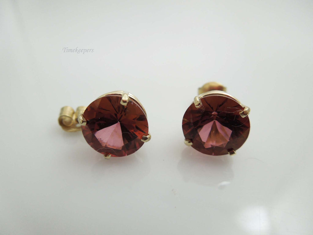 b997 Beautifully Treated Red Topaz Stud Earrings set in 14kt Yellow Gold posts