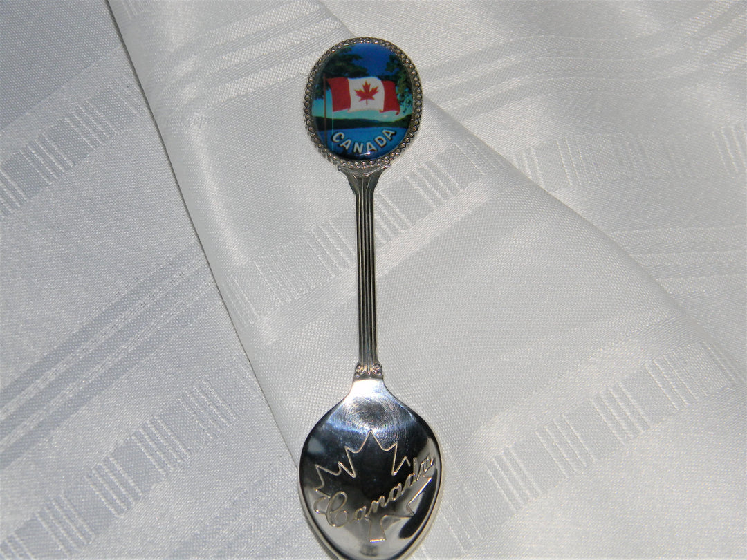j677 Nice Preowned Stainless Steel Collector Spoon from Canada