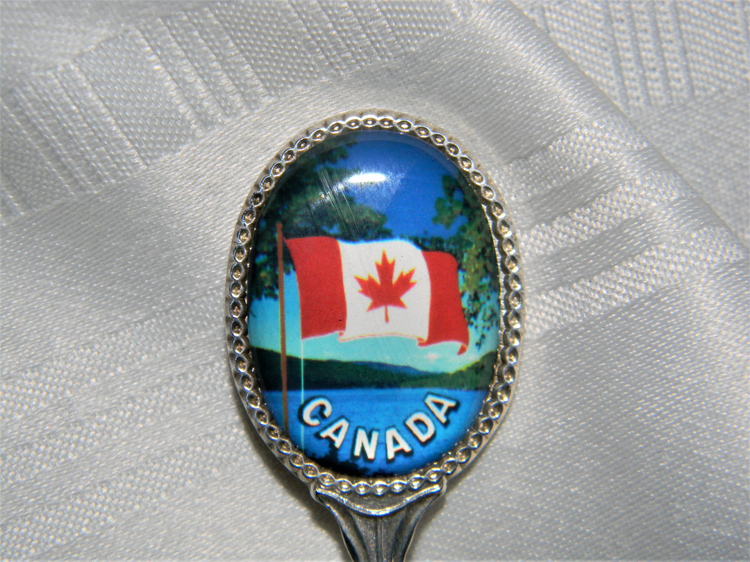 j677 Nice Preowned Stainless Steel Collector Spoon from Canada