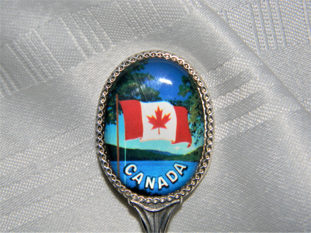 j677 Nice Preowned Stainless Steel Collector Spoon from Canada