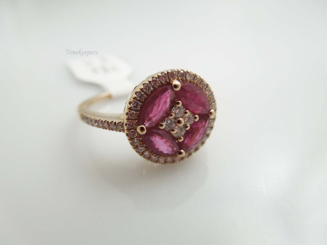 g557 Lovely Ladies 14kt Rose Gold Ruby and Diamond Ring