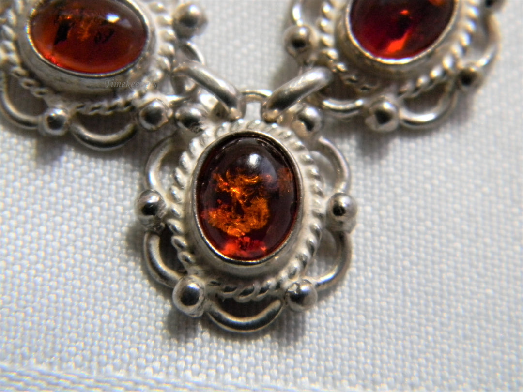 j712 Stunning Amber Necklace in Sterling Silver with Figaro Chain