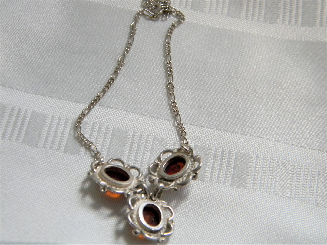 j712 Stunning Amber Necklace in Sterling Silver with Figaro Chain