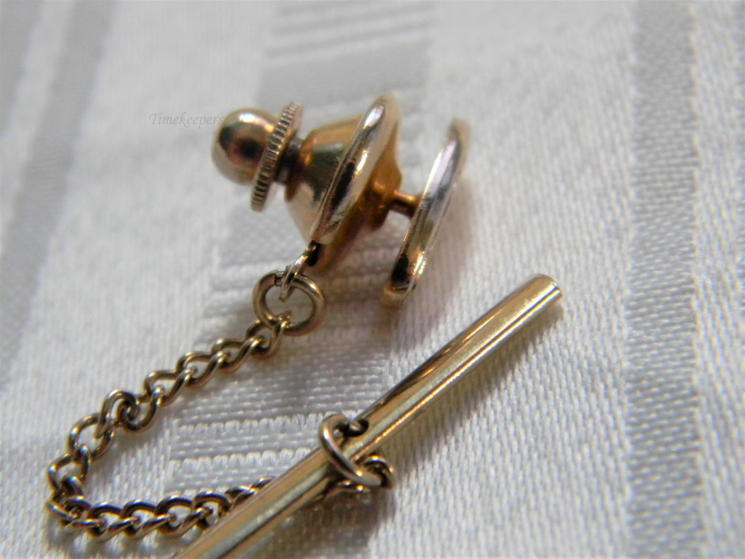 j723 Retro Oval Swank Tie Tack with Etched Edges Polished Center in Gold tone