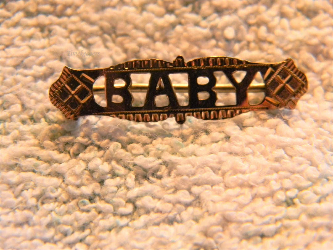 j733 Pretty Vintage Gold Filled Brooch embossed with the Word Baby
