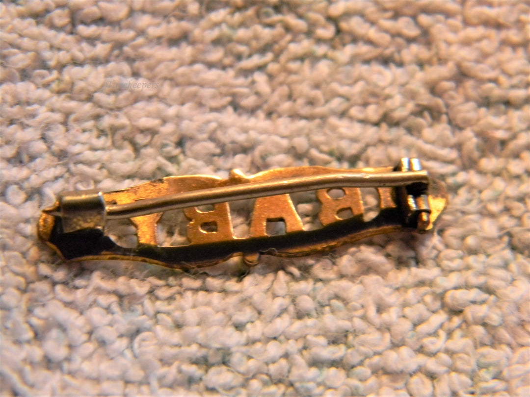j733 Pretty Vintage Gold Filled Brooch embossed with the Word Baby