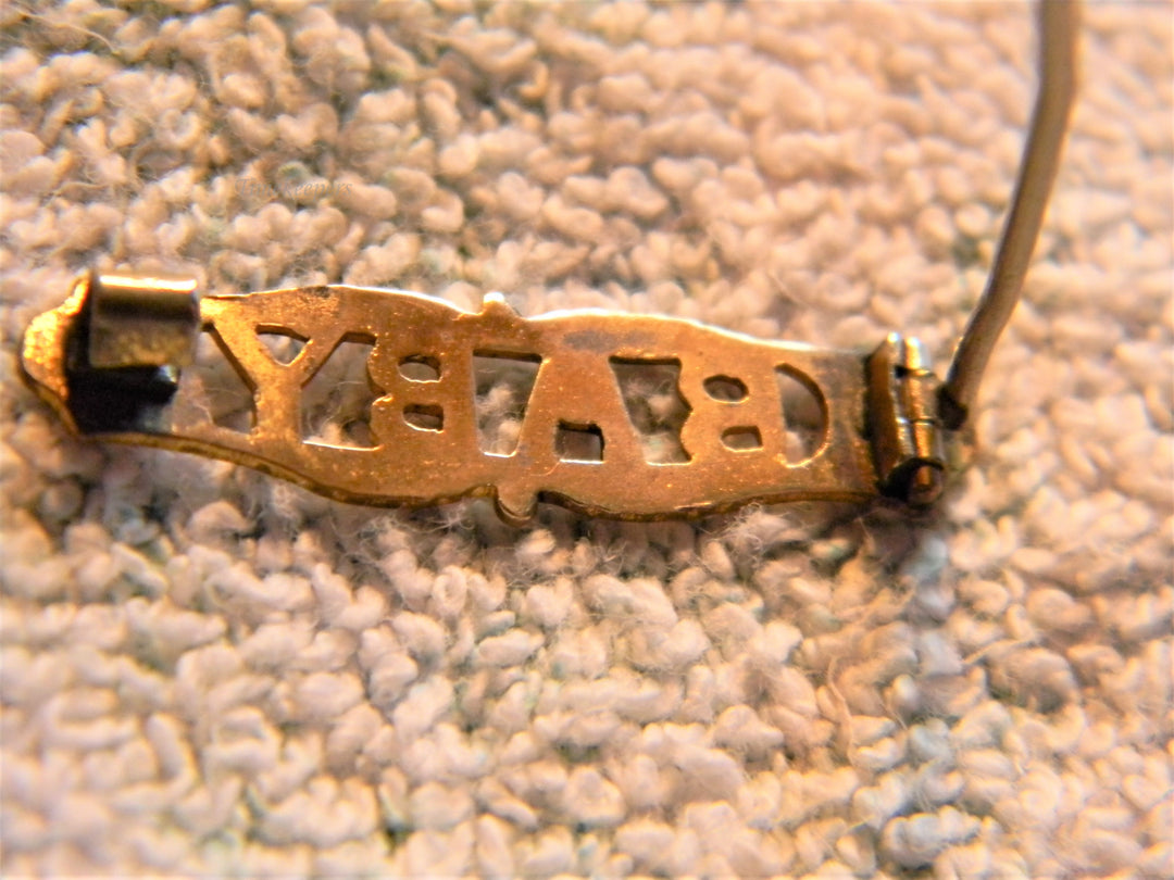 j733 Pretty Vintage Gold Filled Brooch embossed with the Word Baby