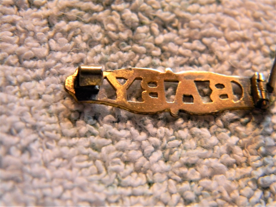 j733 Pretty Vintage Gold Filled Brooch embossed with the Word Baby