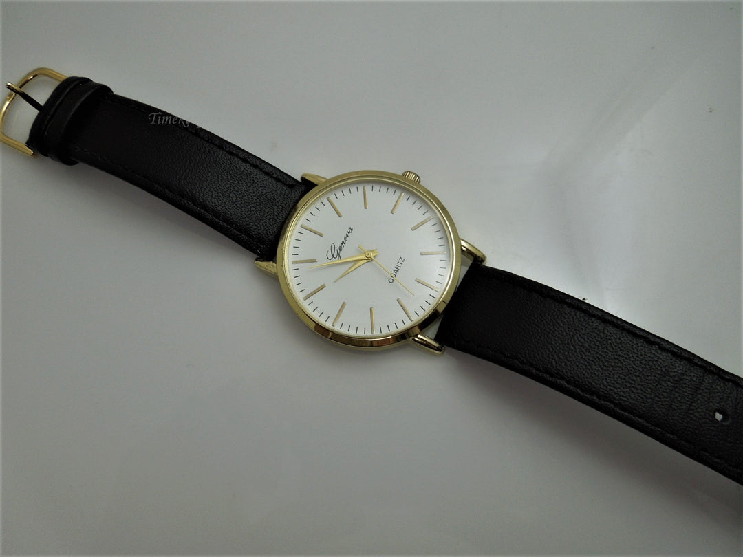 h671 Handsome Geneva Quartz Water Resistant Watch Gold Tone with Stainless Back