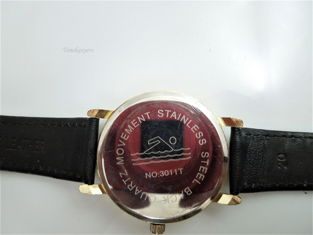 h671 Handsome Geneva Quartz Water Resistant Watch Gold Tone with Stainless Back