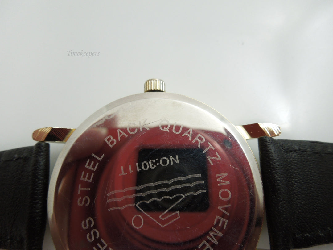 h671 Handsome Geneva Quartz Water Resistant Watch Gold Tone with Stainless Back