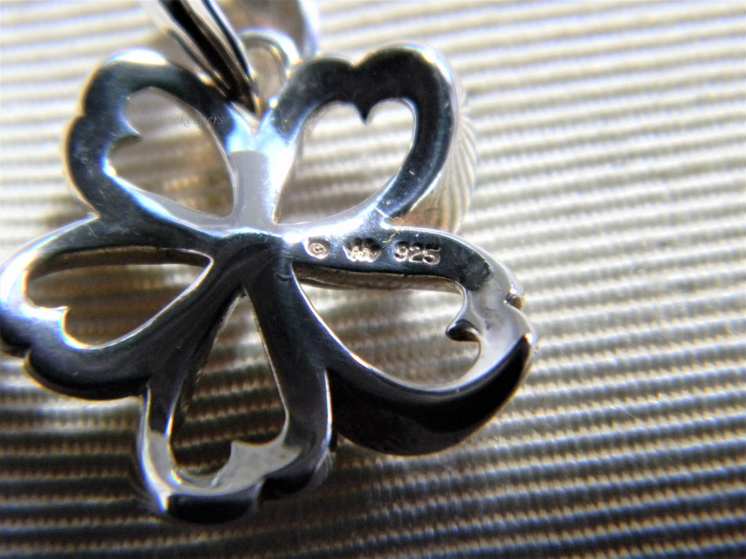 j770 Pretty Preowned Flower Pendant in Sterling Silver with Heart Petals