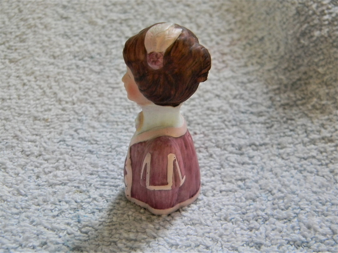 j807 Beautiful Avon 1982 Lady in Pinks with Feathers in Her Hair Bisque Thimble