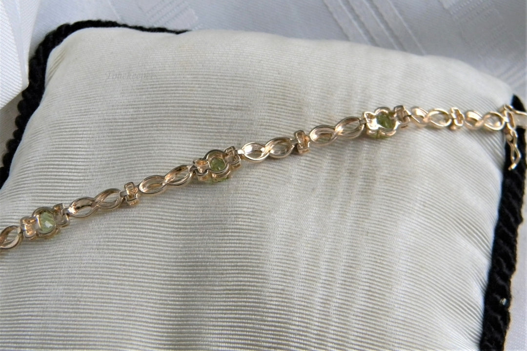 p041 Beautiful Sterling Silver with gold plating Link Bracelet with Peridots