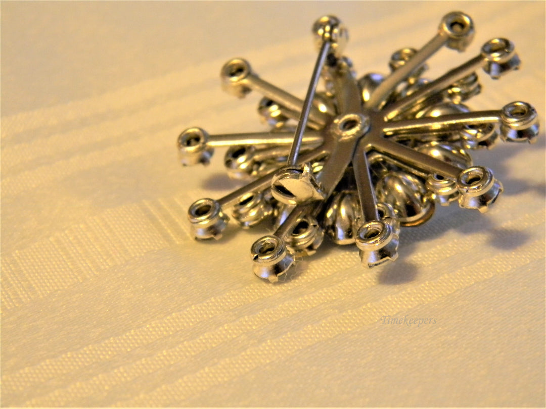 j206 Beautiful Sparkling LIght Blue Flower Burst Brooch from 1950's