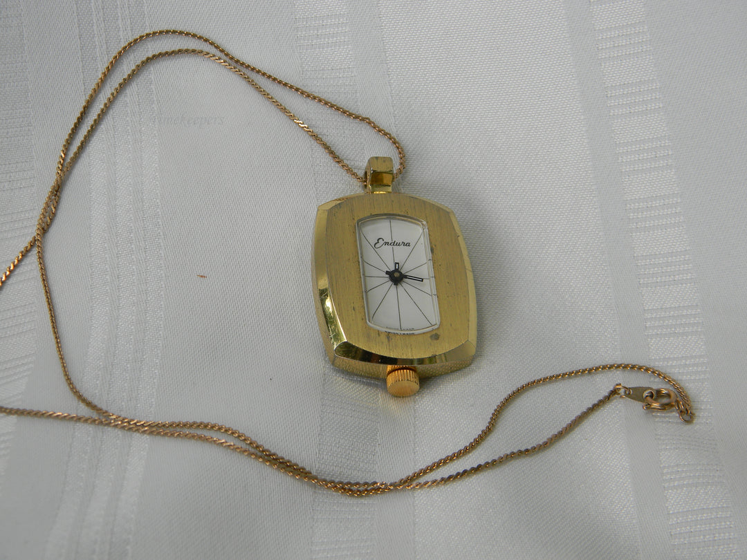 j918 Retro Endura Rectangle Pendant watch with 24" Chain in Gold Tone