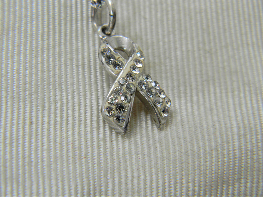 j308 Pretty Crystal Cancer Ribbon Pendant in Sterling Silver on Chain