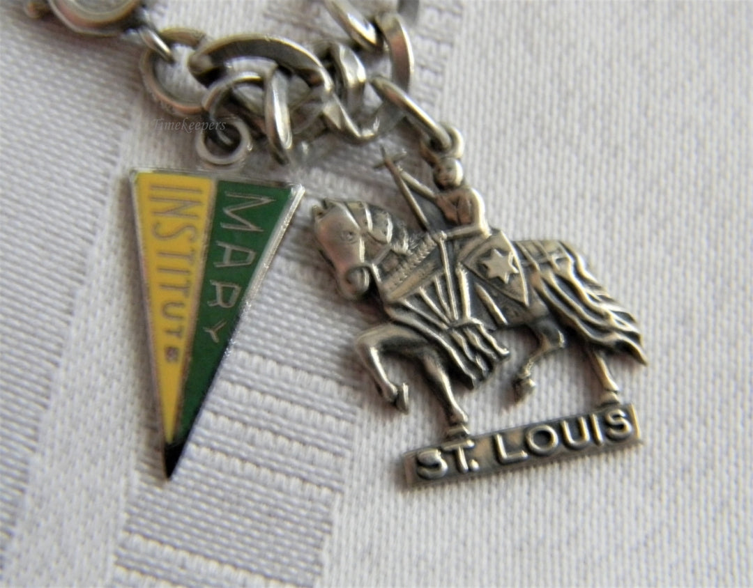 p236 Nice Curb Chain Sterling Silver Charm Bracelet with 3 Charms from St. Louis