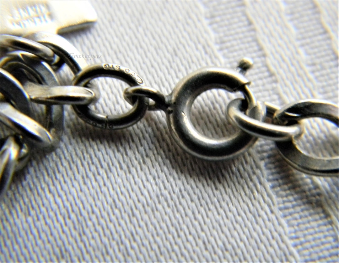 p236 Nice Curb Chain Sterling Silver Charm Bracelet with 3 Charms from St. Louis