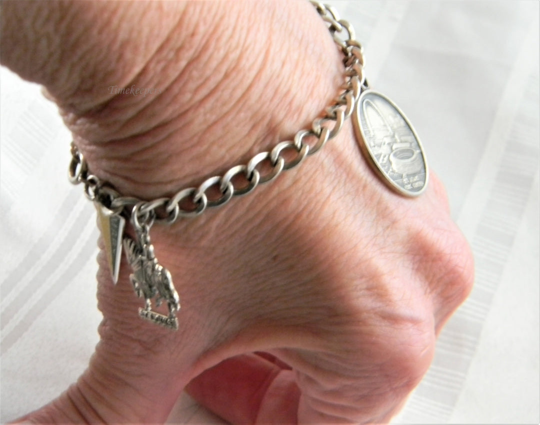 p236 Nice Curb Chain Sterling Silver Charm Bracelet with 3 Charms from St. Louis