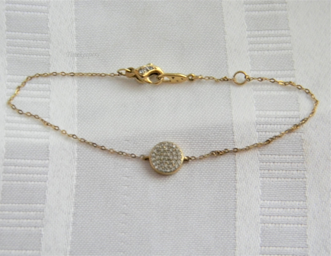 p237 Lovely Gold Tone Rolo Chain Bracelet with Small Medallion Covered with CZ