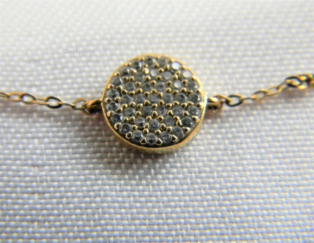 p237 Lovely Gold Tone Rolo Chain Bracelet with Small Medallion Covered with CZ