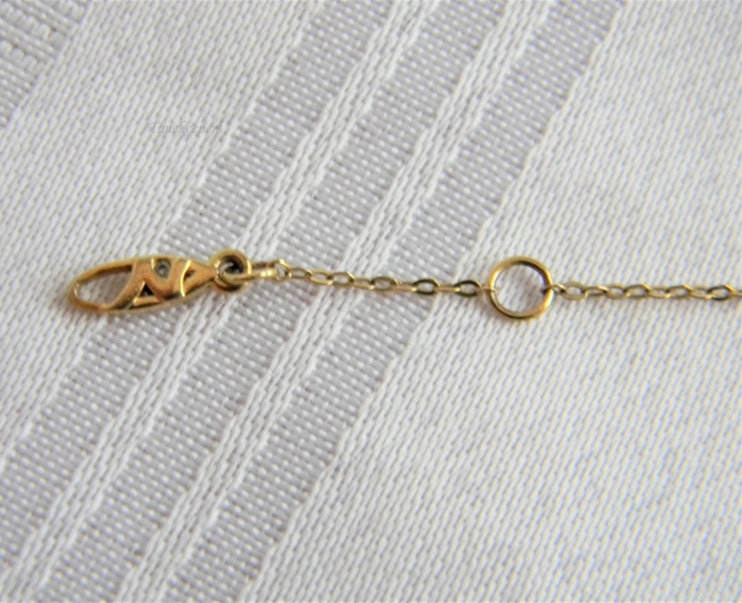 p237 Lovely Gold Tone Rolo Chain Bracelet with Small Medallion Covered with CZ