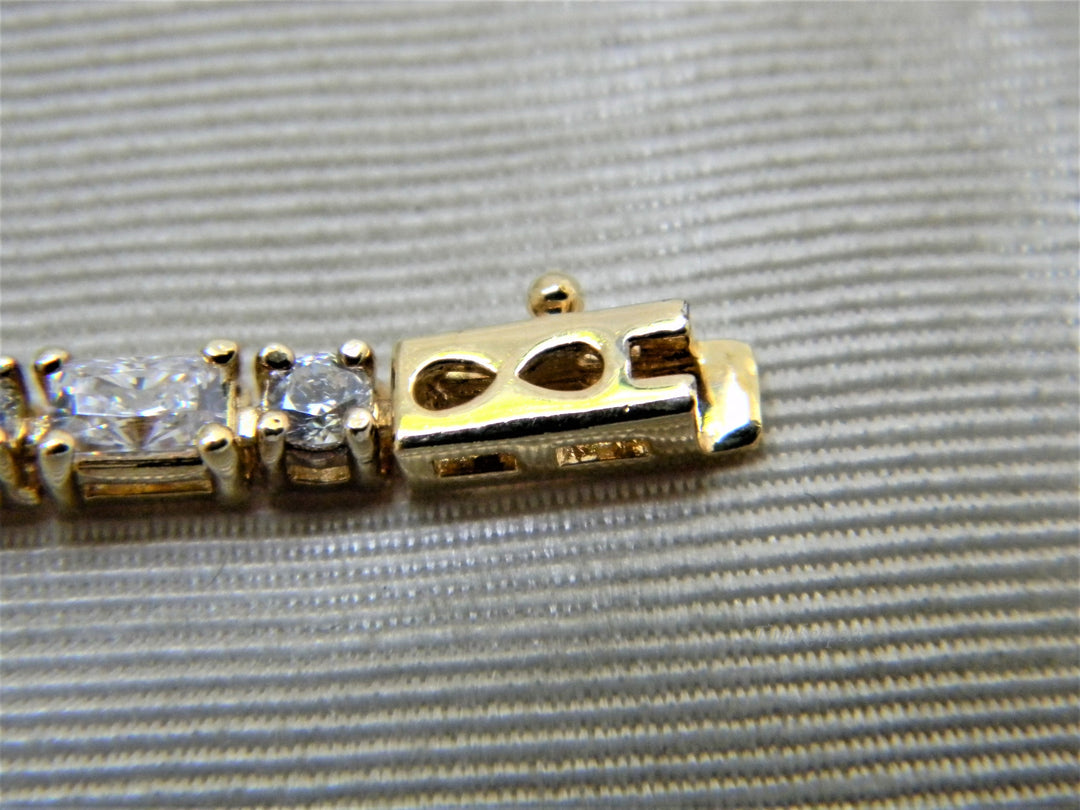 j345 Lovely Sterling Silver Gold Washed Tennis Bracelet with Clear Stones