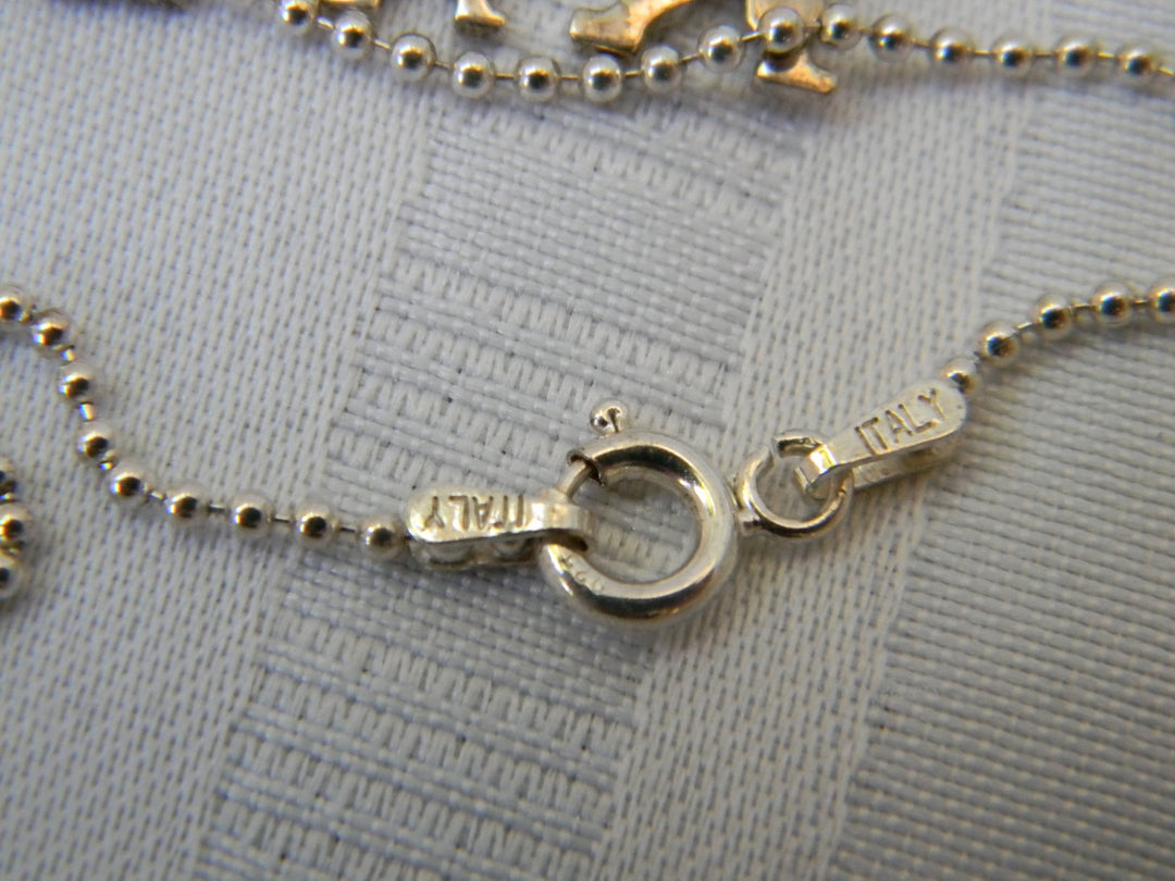 j335 Cute Mom, Dad, and Child Pendant in Sterling Silver