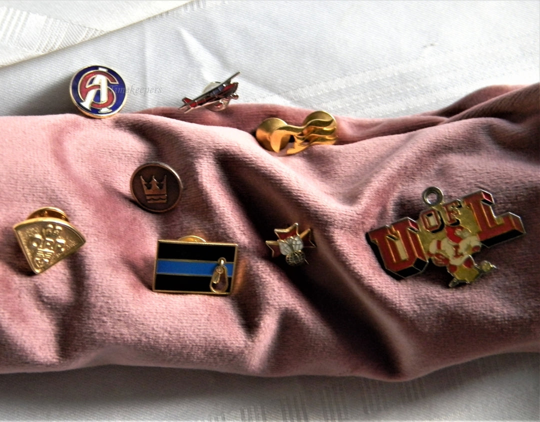 p313 Lot of Eight Lapel Pins Airplane Tie Tac and U of L Pendant