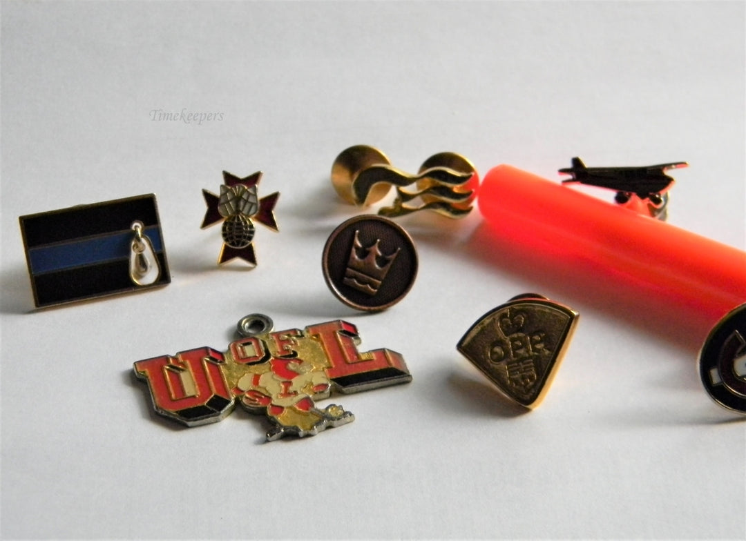 p313 Lot of Eight Lapel Pins Airplane Tie Tac and U of L Pendant
