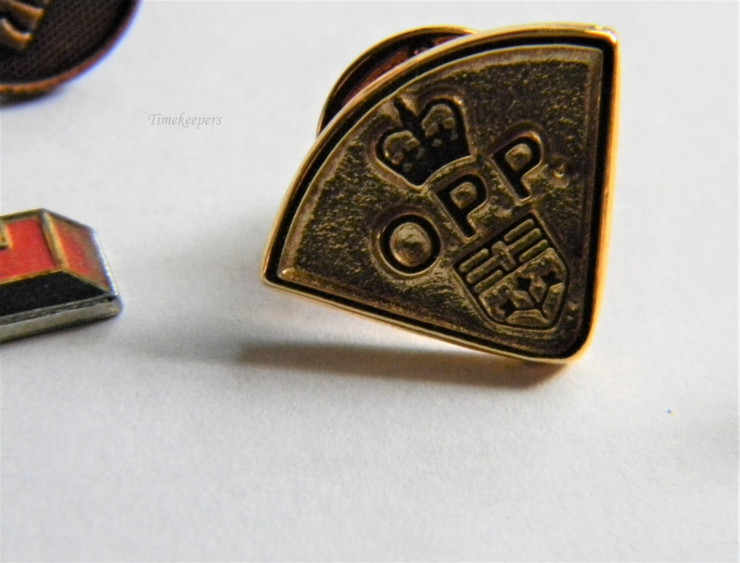 p313 Lot of Eight Lapel Pins Airplane Tie Tac and U of L Pendant