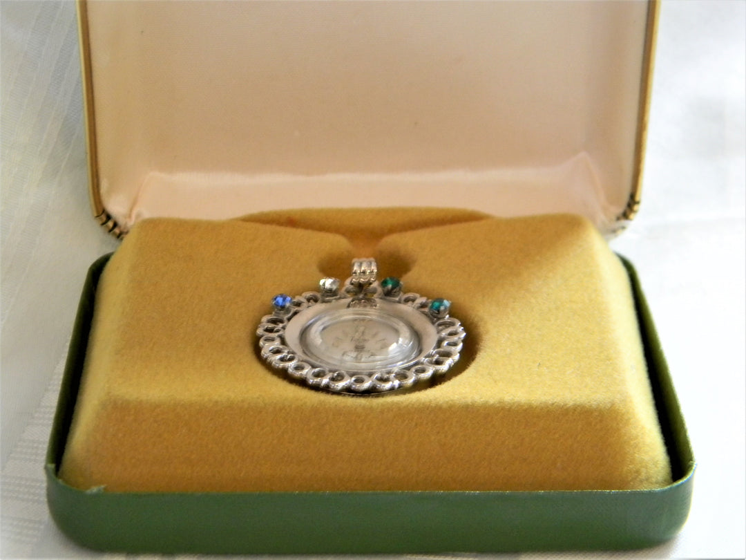 h438 Beautiful Silver tone Pendant Watch with Colored Stones