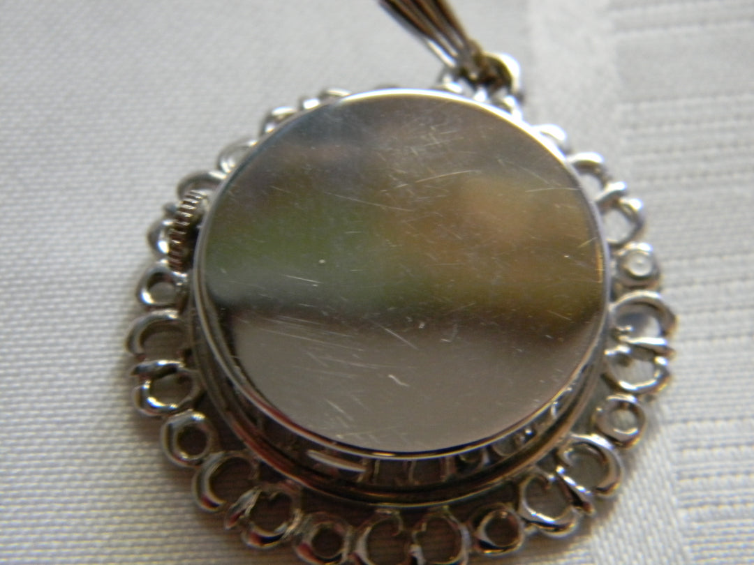 h438 Beautiful Silver tone Pendant Watch with Colored Stones