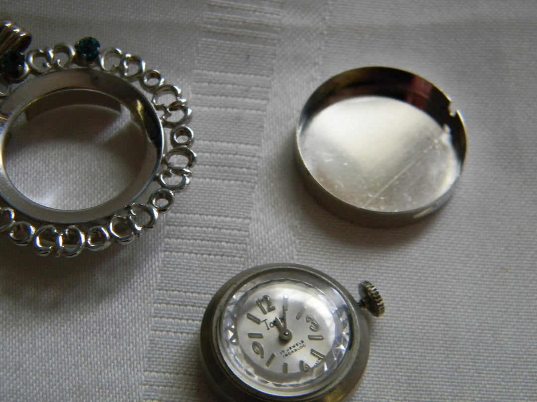 h438 Beautiful Silver tone Pendant Watch with Colored Stones