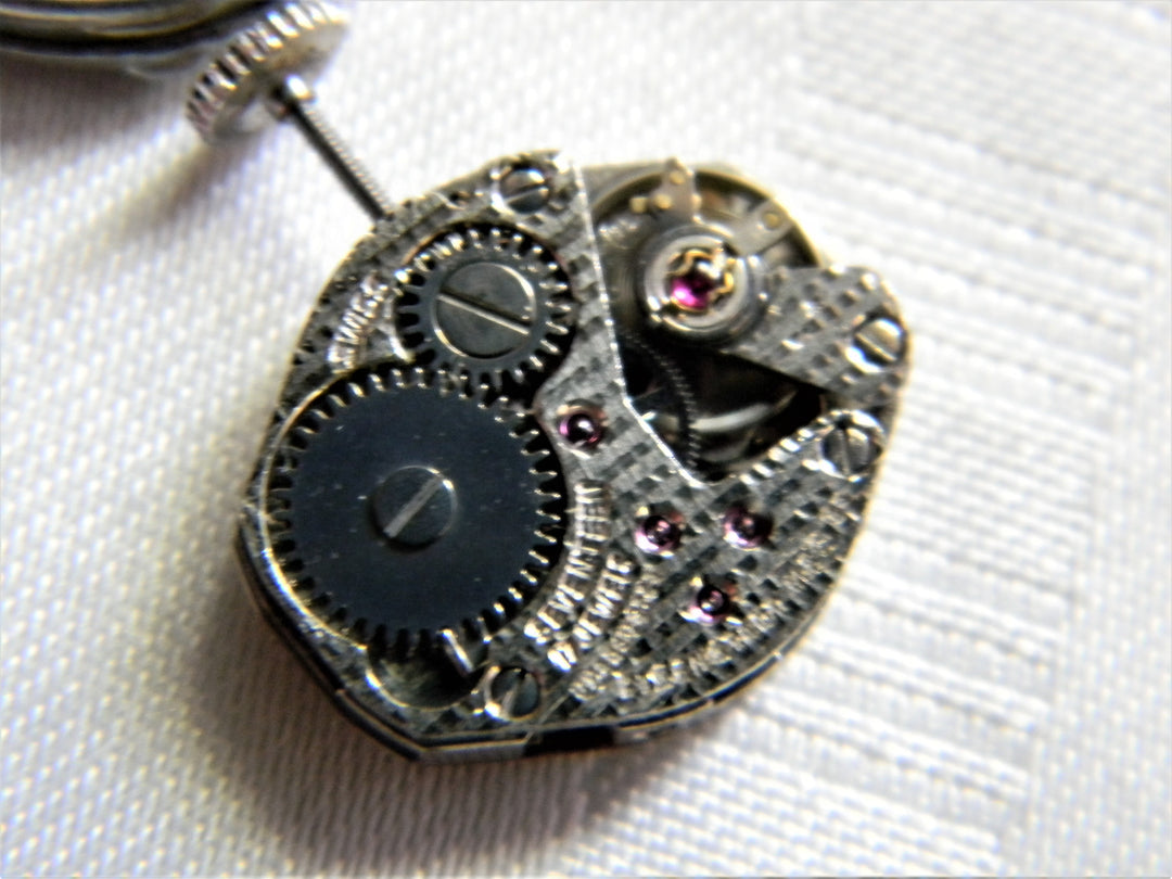 h438 Beautiful Silver tone Pendant Watch with Colored Stones