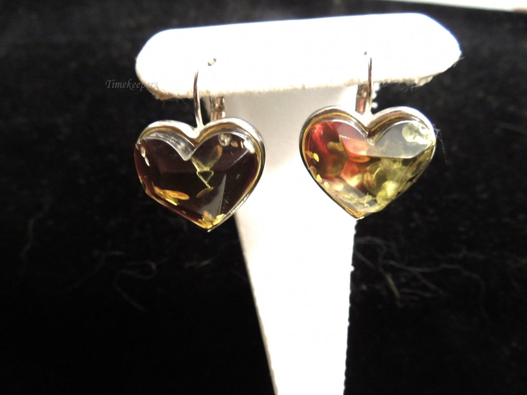 k570 Ladies Unique Silver Tone Heart Shaped Dangle Earrings