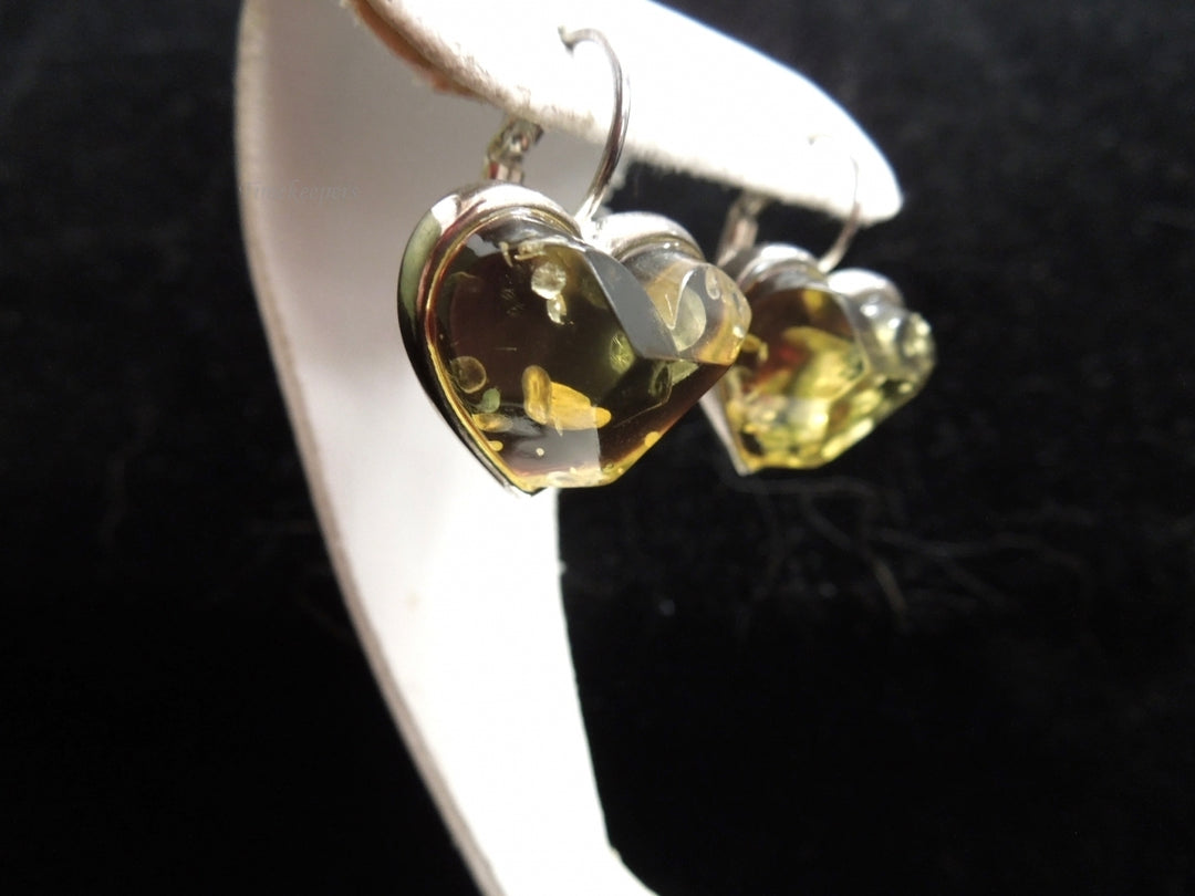 k570 Ladies Unique Silver Tone Heart Shaped Dangle Earrings