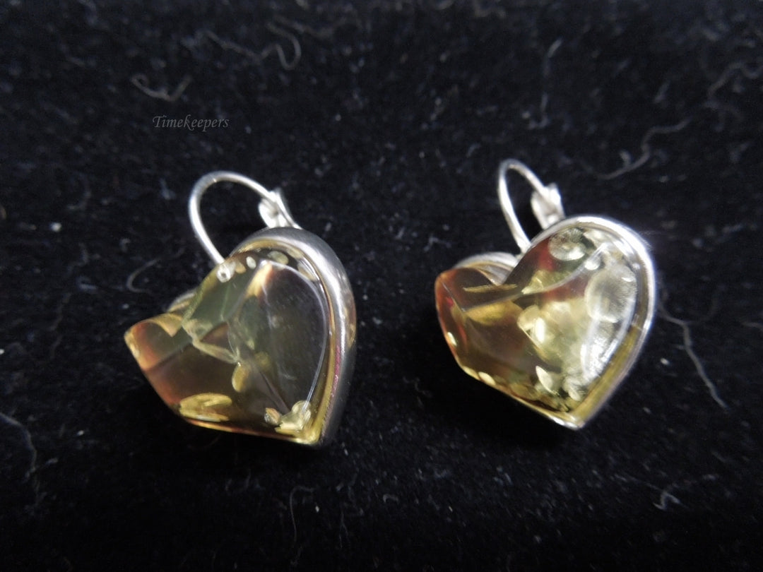 k570 Ladies Unique Silver Tone Heart Shaped Dangle Earrings