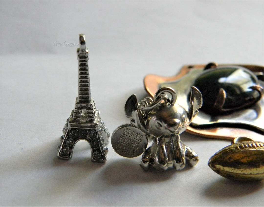 p339 Lot of 4 Pendants Abstract, Football, Stitch, Eiffel Tower No Chains